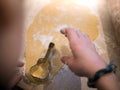 Christmas Bakery: Little girl cutting out guitar form for christmas cookies Royalty Free Stock Photo