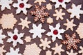 Christmas baking background with an assortment of snowflake cookies