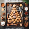 Christmas baking background with fir tree made from kitchen utensils, cookies, spices, cinnamon sticks, anise stars Royalty Free Stock Photo