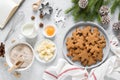 Christmas baking culinary background. Xmas gingerbread on kitchen table and ingredients for cooking Royalty Free Stock Photo