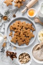 Christmas baking culinary background. Xmas gingerbread on kitchen table and ingredients for cooking festive cookies Royalty Free Stock Photo