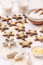 Christmas baking - homemade chocolate cookies with sprinkles and baking ingredients Royalty Free Stock Photo