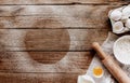 Christmas baking concept. Ingredients, kitchen utensils, wooden background