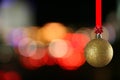 Christmas ball against bluring light