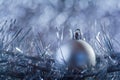 Christmas ball on blue abstract bokeh background Royalty Free Stock Photo