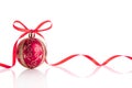 Christmas ball and bow isolated on white background Royalty Free Stock Photo