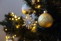 Christmas ball decorations on the Xmas tree during holidays. Royalty Free Stock Photo