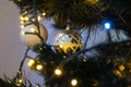 Christmas ball decorations on the Xmas tree during holidays.