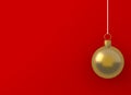 Christmas ball golden ornament hanging on red background. picture copy space for art work design ad or add text message. Holiday c