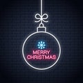 Christmas ball neon sign. Merry xmas neon on wall background