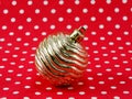 Christmas ball on red polka dot background Royalty Free Stock Photo