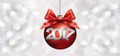 Christmas ball with red satin ribbon bow and 2017 text on silver Royalty Free Stock Photo