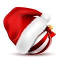 Christmas ball, Santa Claus Hat with Fur on white Royalty Free Stock Photo