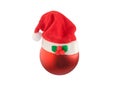 Christmas ball with Santa hat on white.