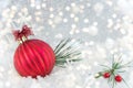 Christmas ball on shiny silver background Royalty Free Stock Photo