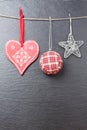 Christmas ball, silvered star and a red heart