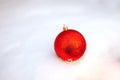 Christmas ball on snow. Royalty Free Stock Photo