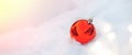 Christmas ball on snow. Royalty Free Stock Photo