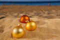 Christmas balls on beach Royalty Free Stock Photo