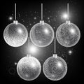 Christmas balls on a black background with silver decoration
