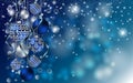 Christmas balls on blue background with Stardust sparks