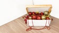 Christmas gold and red Christmas balls and decorations for the Christmas tree lie in a box. Royalty Free Stock Photo