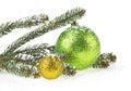 Christmas balls and fir branches isolated in snow, white background Royalty Free Stock Photo