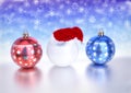 Christmas balls and golf ball with santa red hat on bokeh background. 3D render Royalty Free Stock Photo
