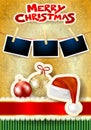 Christmas balls, hat, photo frames and text on paper background. Royalty Free Stock Photo