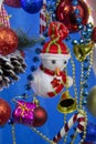 Christmas new year snowman snowman close-up on blue background Royalty Free Stock Photo