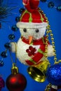 Christmas balls, new year snowman snowman close-up on blue background Royalty Free Stock Photo