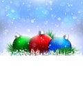 Christmas balls with pine and blank space on blue Royalty Free Stock Photo