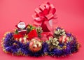 Christmas balls and purple tinsel