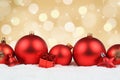 Christmas balls red decoration snow winter golden background cop