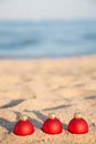 Christmas balls on sea coast Royalty Free Stock Photo
