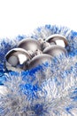 Christmas balls with silver and blue tinsel Royalty Free Stock Photo