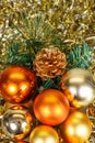 Christmas balls, tinsel and artificial fir tree branch Royalty Free Stock Photo