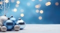 Christmas balls and toys on a blue and gold background with bokeh lights on Christmas Eve. Royalty Free Stock Photo