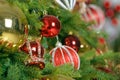 Christmas balls toys on fir tree. New Year holidays and Christmastime celebration. Royalty Free Stock Photo