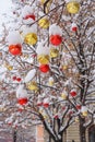 Christmas balls on tree covered with snow. Streets of Moscow decorated for New Year and Christmas celebration. Russia Royalty Free Stock Photo