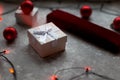 Christmas balls and white vinous gift boxes form the decoration of the Christmas tree, in the background in the form of a bokeh