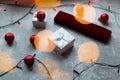 Christmas balls and white vinous gift boxes form the decoration of the Christmas tree, in the background in the form of a bokeh