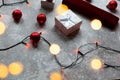 Christmas balls and white vinous gift boxes form the decoration of the Christmas tree, in the background in the form of