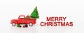 Christmas banner background of Christmas truck and gifts with text Merry Christmas