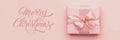 Christmas banner. Beautiful pink christmas gift on pastel pink paper background