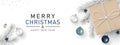 Christmas banner. Gift box, Gray pine branch, Christmas balls, Confetti, and star isolated on white background. Top view.