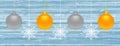 Christmas banner with gold and silver balls and white snowflakes. Royalty Free Stock Photo