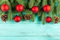 Christmas banner with green tree, red and white handmade felt decorations on white wooden textured background Royalty Free Stock Photo