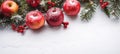 Christmas banner with apples on white background with snow, snowflake, fir tree branches. Xmas decoration top view with copy space Royalty Free Stock Photo