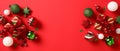 Christmas banner template with baubles, stars, gift boxes on red background. Merry Christmas and Happy New Year concept. Flat lay Royalty Free Stock Photo